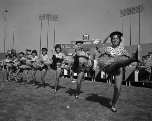 cheerleaders in 1960's kicking like rockets